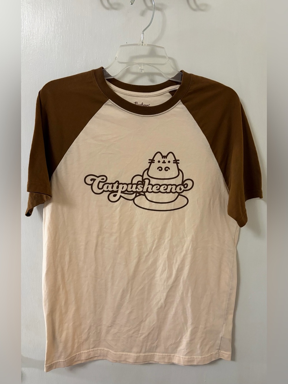 Pusheen Two-Tone Cream and Brown Raglan Tee with Catpusheeno Graphic